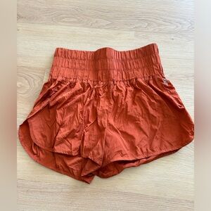 Free People movement “the way home” running short women’s large NWOT rust